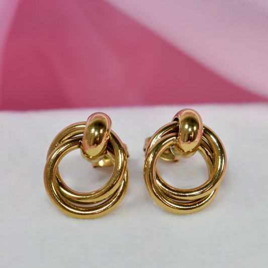 Aretes Dorados Retorcidos ✨